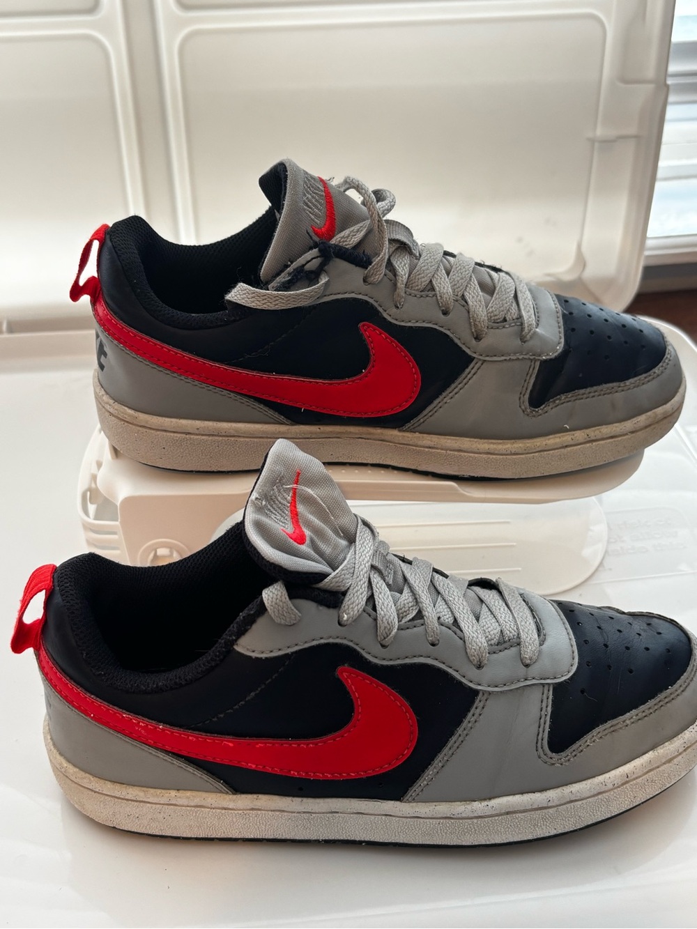 Nike Youth Low-Top Sneaker in Navy/Gray with Red Swoosh